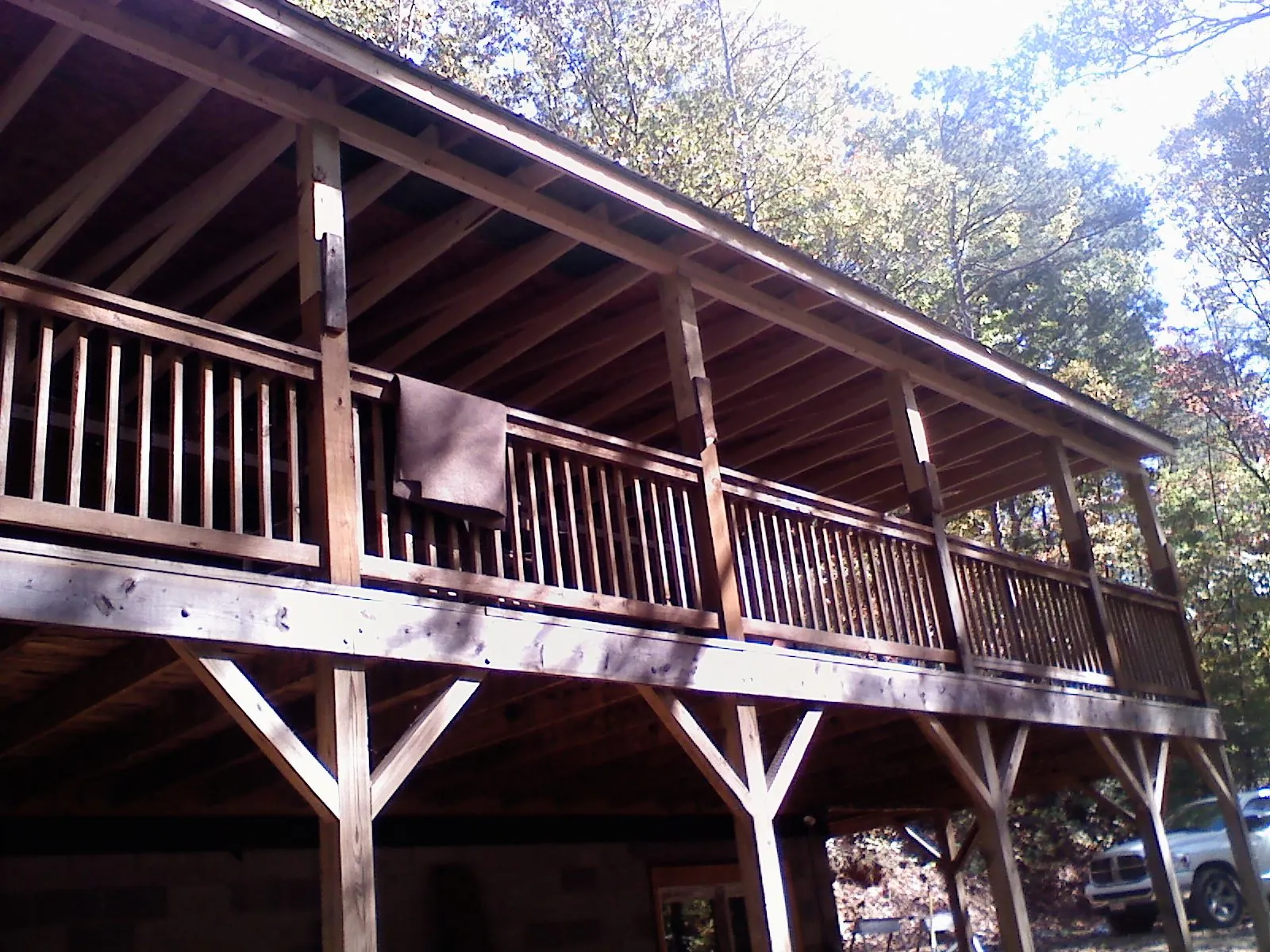 Timber framing under a new elevated porch and deck — Roof Leak Repair in Trumbull by Roofing Brothers